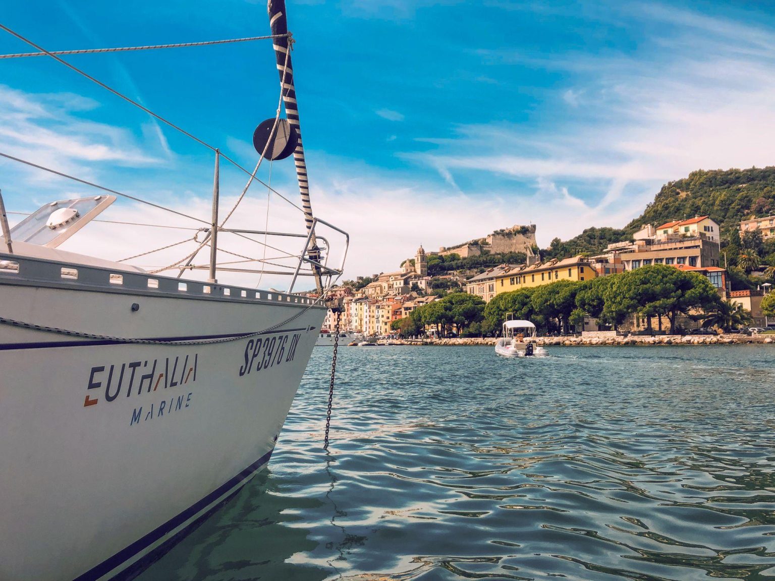 Luxury yacht safely docked at the coast representing Euthalia Marine safety solutions